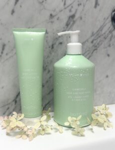 Bamford Baby Chamomile baby lotion and wash on marble surface.