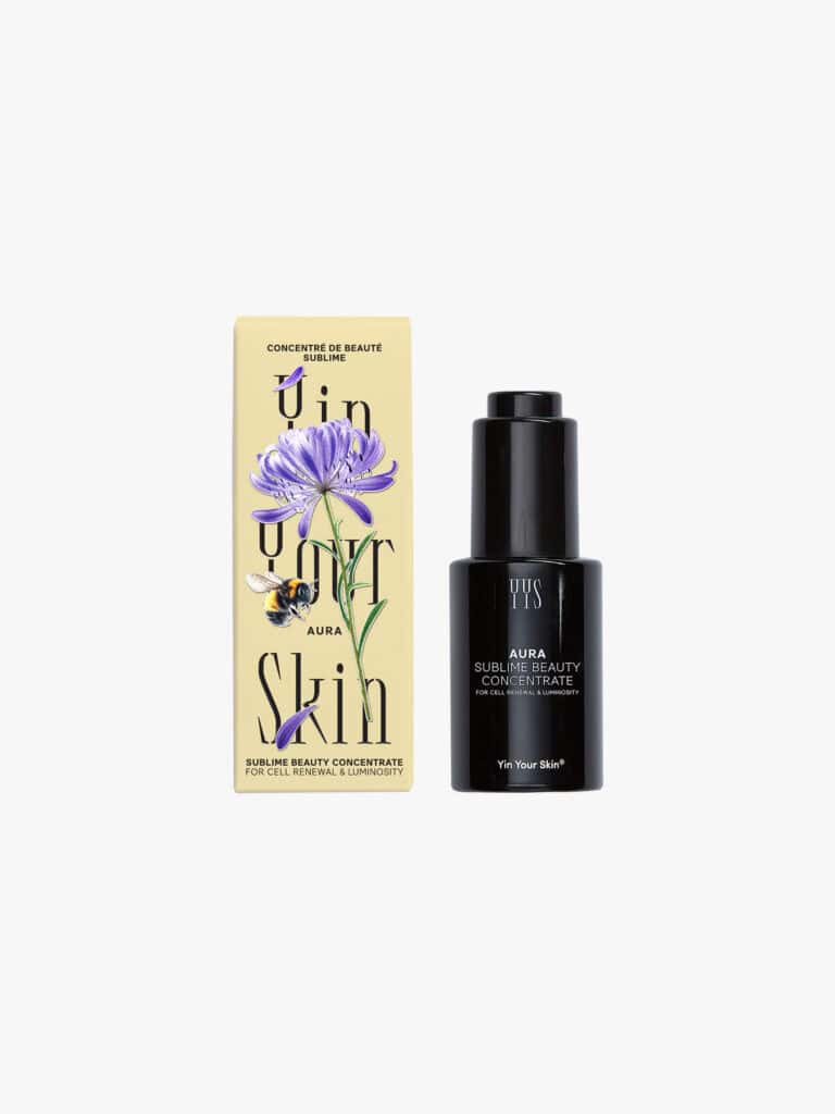 Eteritique Aura Sublime Beauty Concentrate i svart flaska och förpackning.
